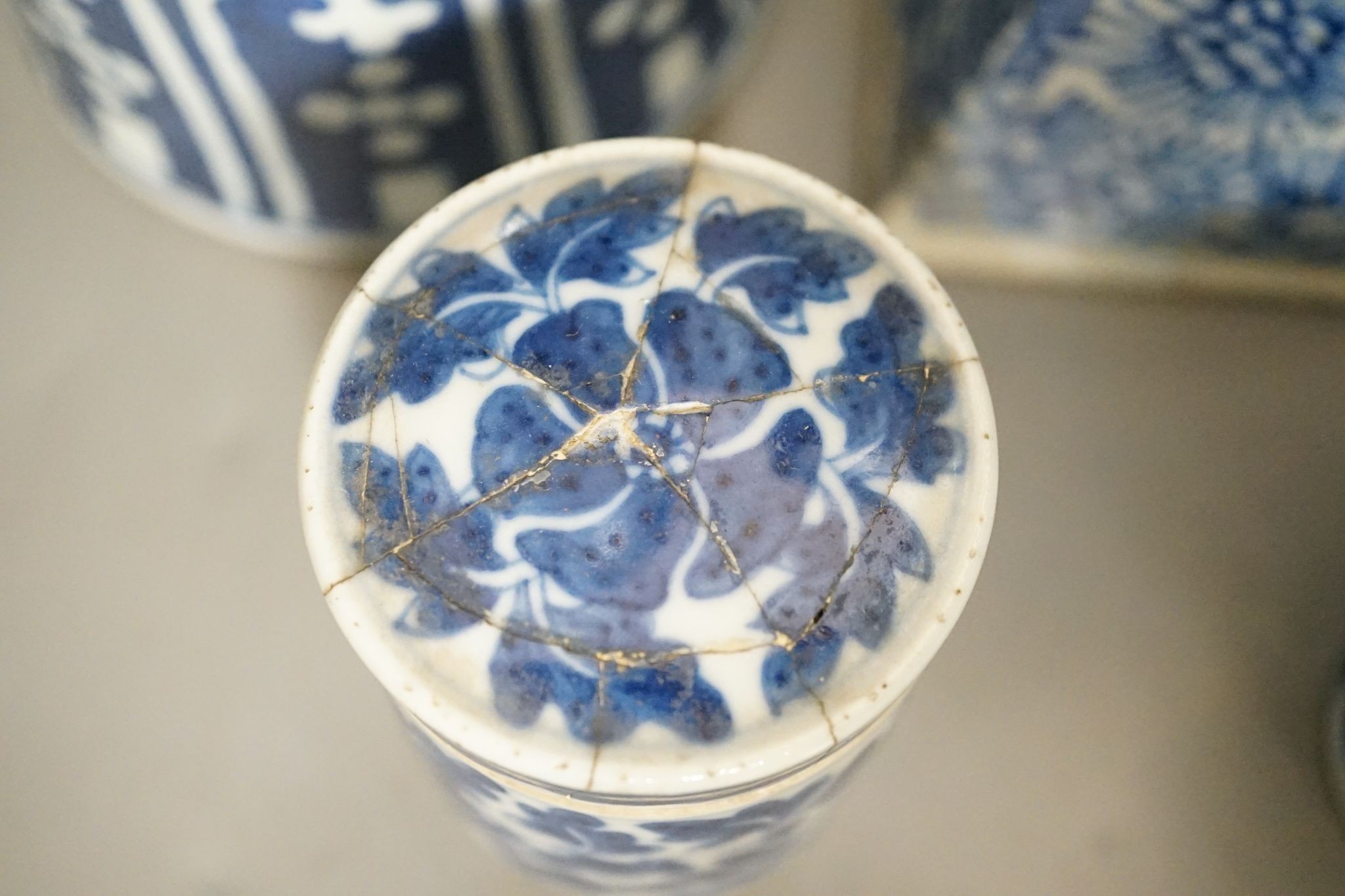 A group of 19th century Chinese blue and white vases, tallest 38.5cm, pots and a candlestick (5)